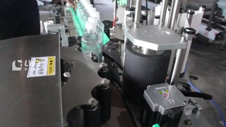 Sterwielpositionering etiketteermachine voor ronde flessen